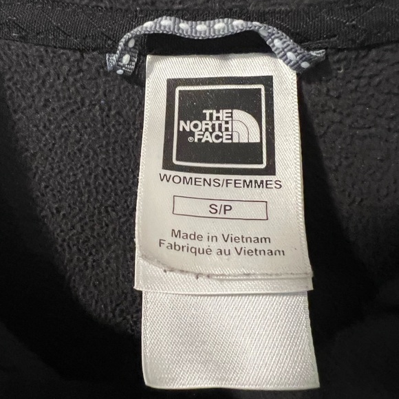 North face Small, embossed pattern, black fleece, front pockets with hood. - Picture 10 of 15